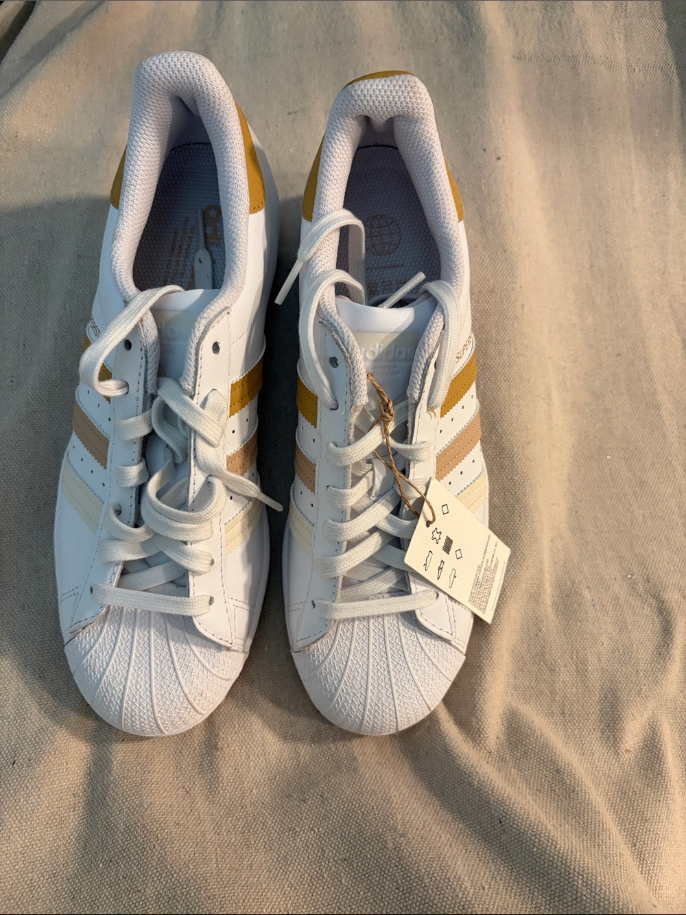 adidas men’s White Sneakers with Gold and Tan Stripes